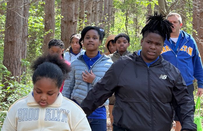  5th graders taking a hike outside with our Gym Teacher. 